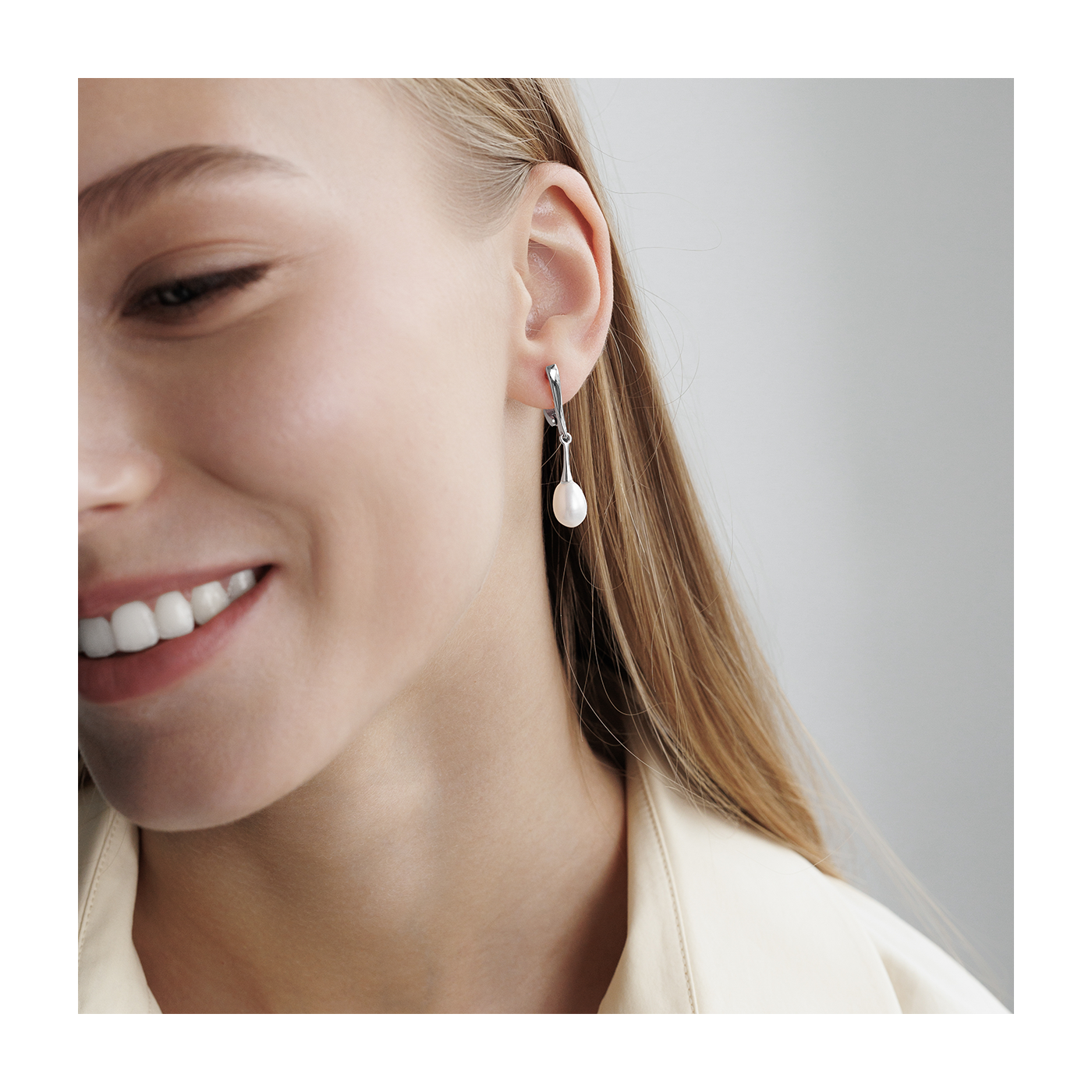 Dangling Silver Pearl Earrings
