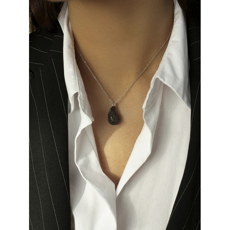 Silver necklace with a black teardrop pendant
