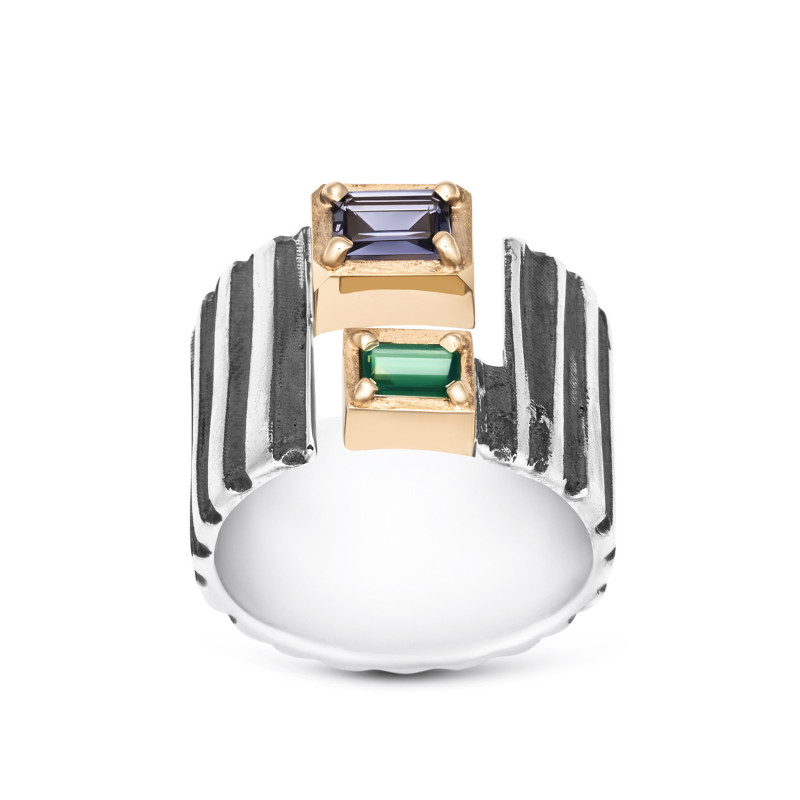 Silver ring with iolite and emerald in solid gold setting