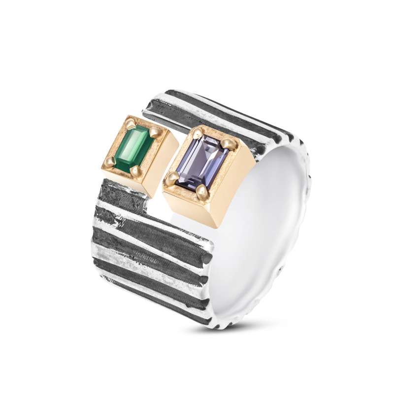 Silver ring with iolite and emerald in solid gold setting