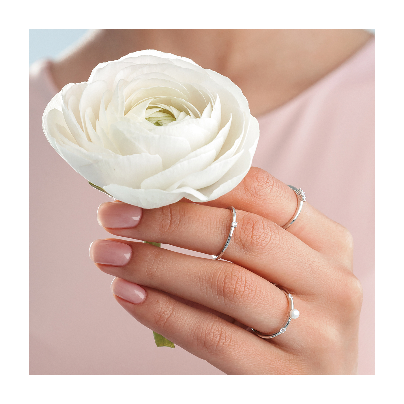 Set of three silver rings with a pearl and zirconia stones
